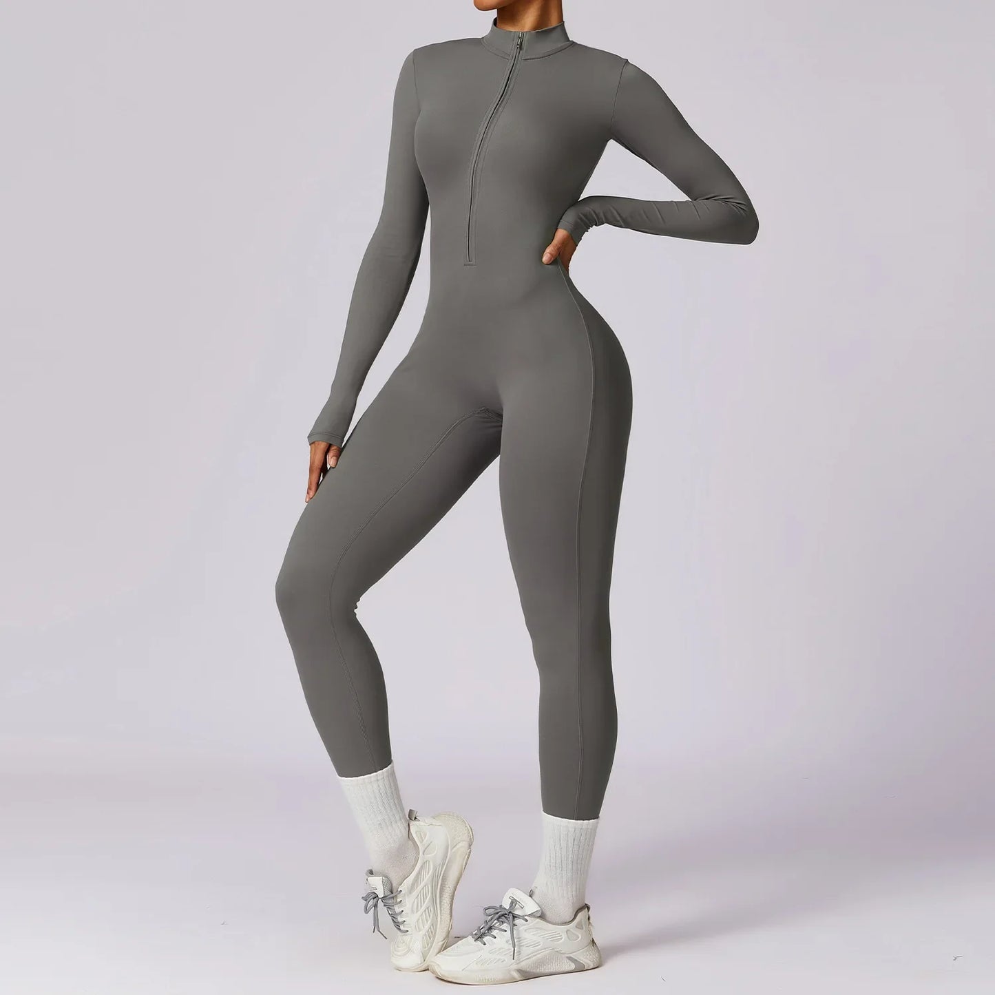 Combinaison de sport moulant à manches longues avec zip